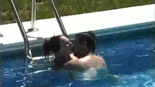 This sexy redhead milf is eaten out and fucked in the pool - porn video