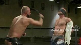 Two submissive gay men are suspended - porn video