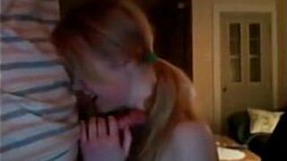 Redhead teen GF sucks cock takes cumshot on webcam - porn video